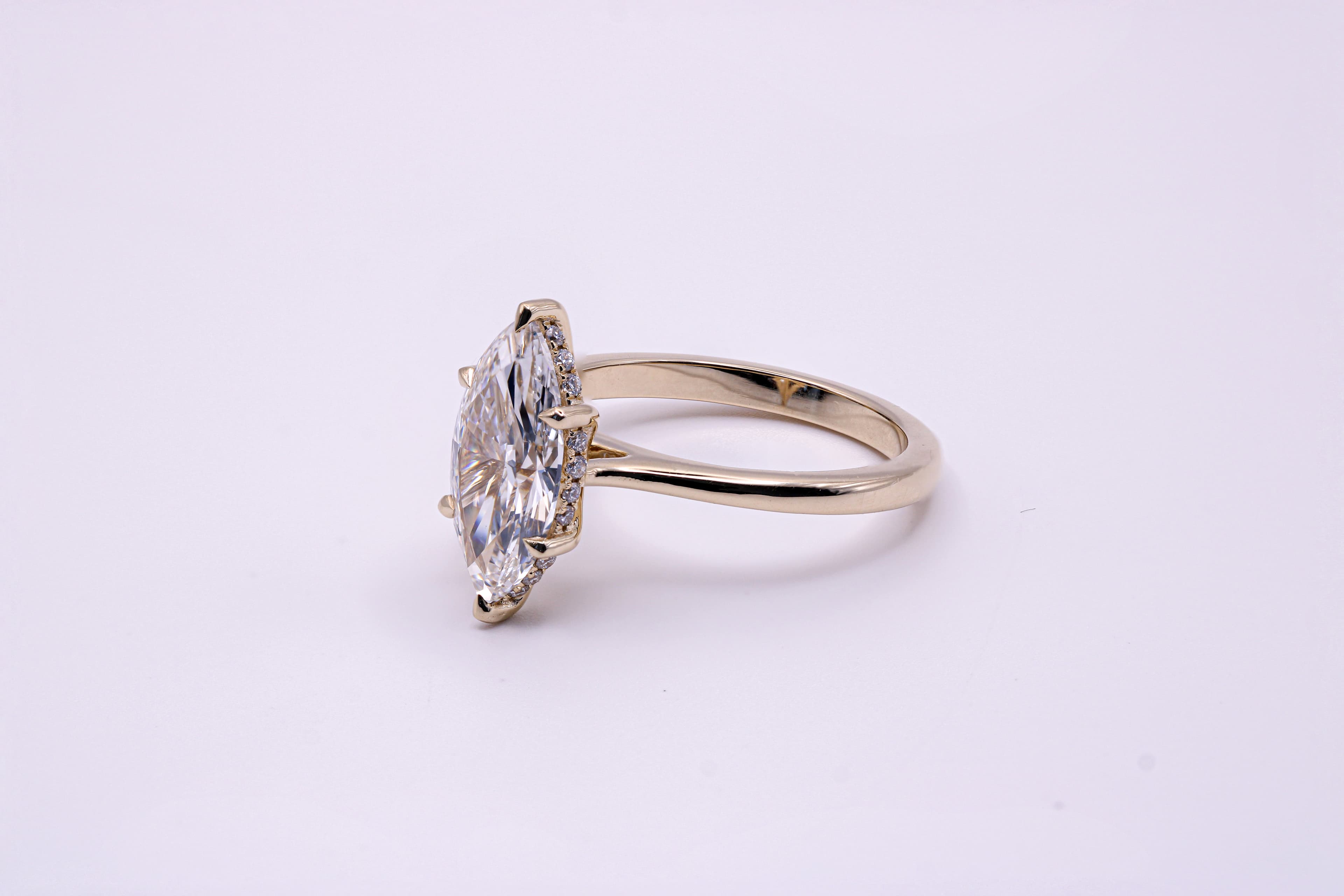 Marquise hidden halo engagement ring