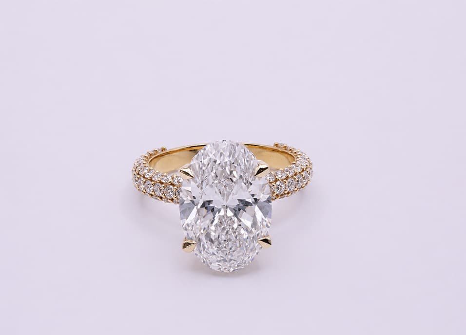 Oval diamond pave engagement ring